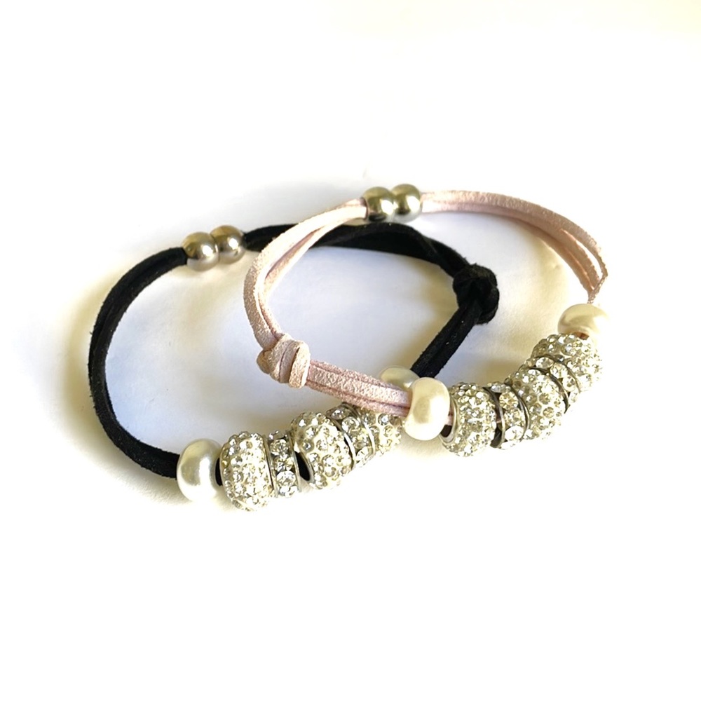 Set of two pink and black bracelets with rhinestone baubles